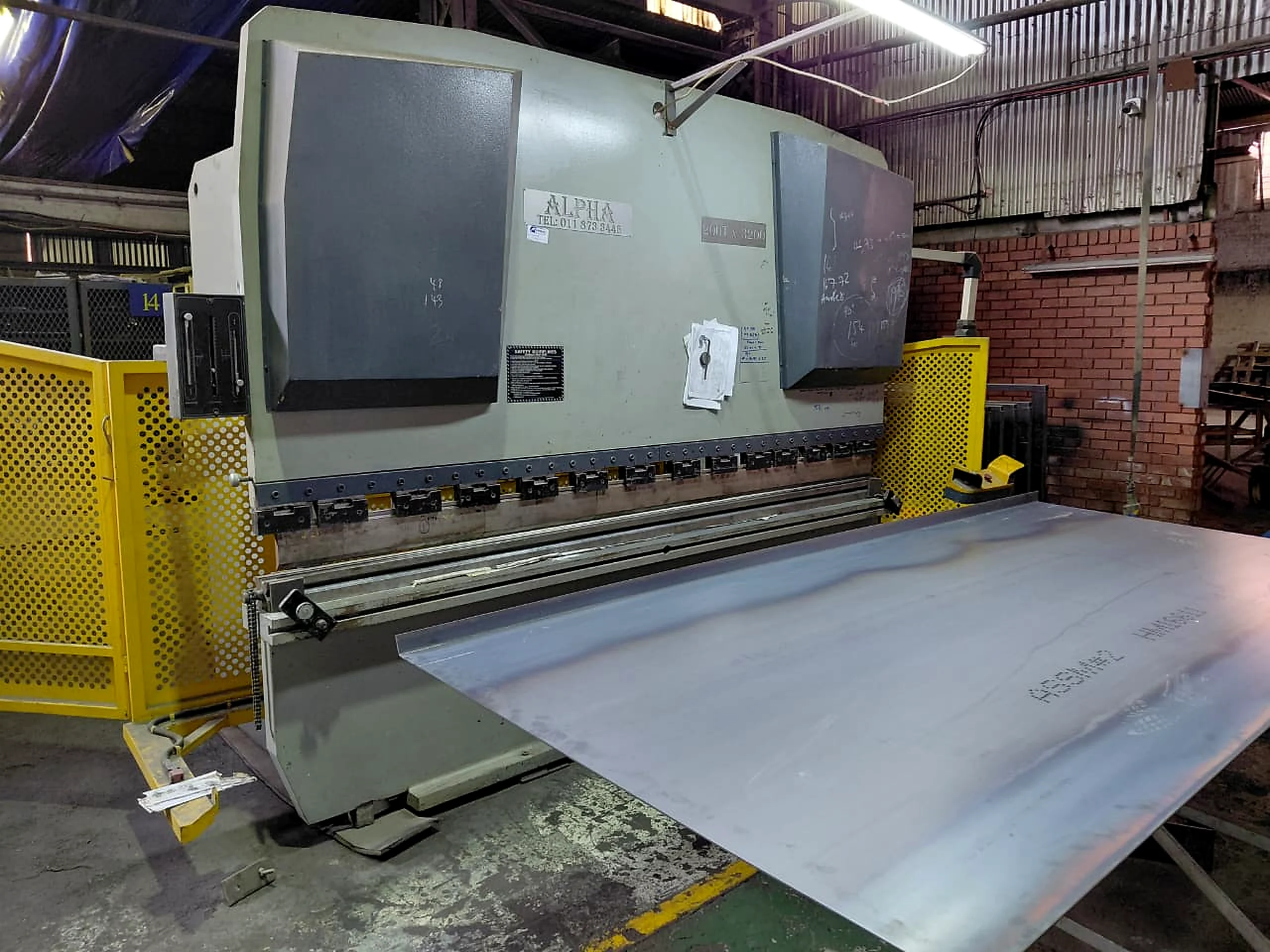 Industrial press brake machine in a workshop